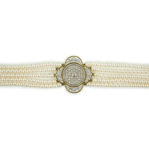 443 - A quintuple strand seed pearl choker necklace, with pierced gold, platinum and diamond cluster set q... 