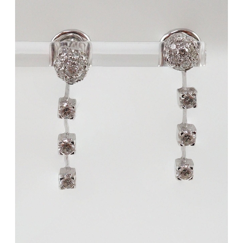 445 - A modern pair of 18ct white gold, diamond cluster and three stone diamond drop set earrings, 28mm, g... 