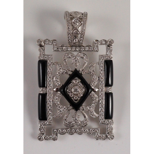 446 - A modern 1920's style pierced 18k white gold, diamond and black onyx set rectangular pendant, the to... 