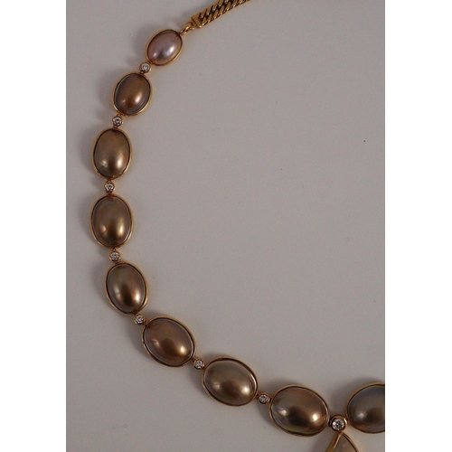 450 - A cased modern single strand graduated shaped mabe pearl and round brilliant cut diamond set drop ne... 