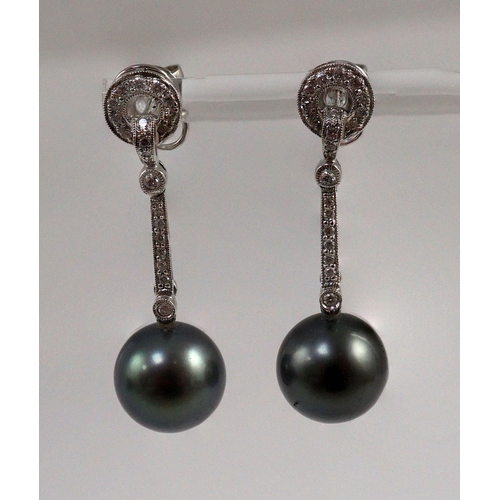 452 - A modern pair of single stone South Sea Tahitian pearl style and diamond chip set drop earrings, eac... 