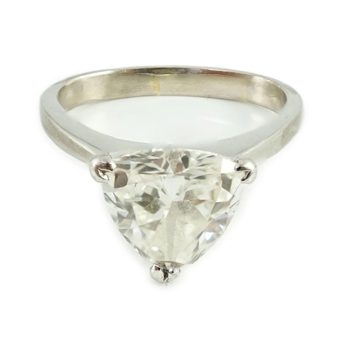 458 - A modern platinum and solitaire trillion cut diamond set ring, the shaped shank stamped Yau Wing, th... 