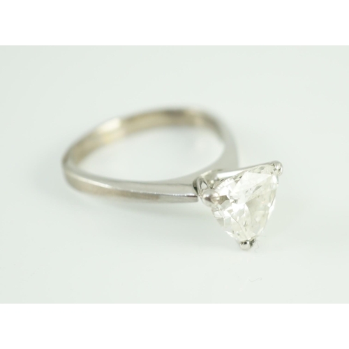 458 - A modern platinum and solitaire trillion cut diamond set ring, the shaped shank stamped Yau Wing, th... 