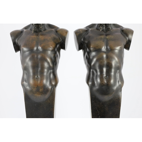 46 - A pair of early 20th century French bronze terms, each in the form of a satyr, 16cm wide 62cm high... 