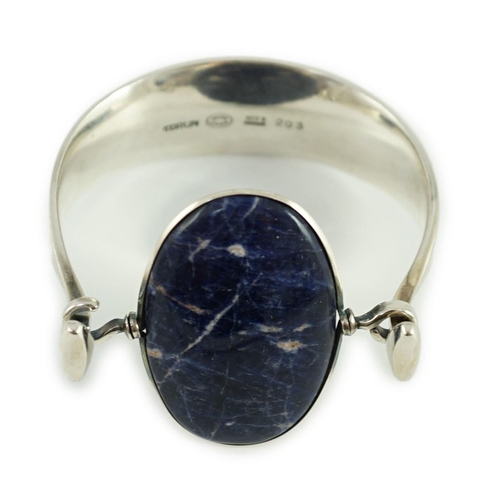 463 - A Vivianna Torun for Georg Jensen sterling silver and oval cabochon lapis lazuli set bangle, numbere... 