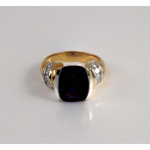 467 - A modern 18ct gold and single stone cushion cut amethyst set dress ring, with ten stone diamond set ... 