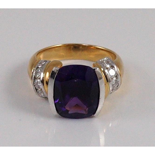 467 - A modern 18ct gold and single stone cushion cut amethyst set dress ring, with ten stone diamond set ... 