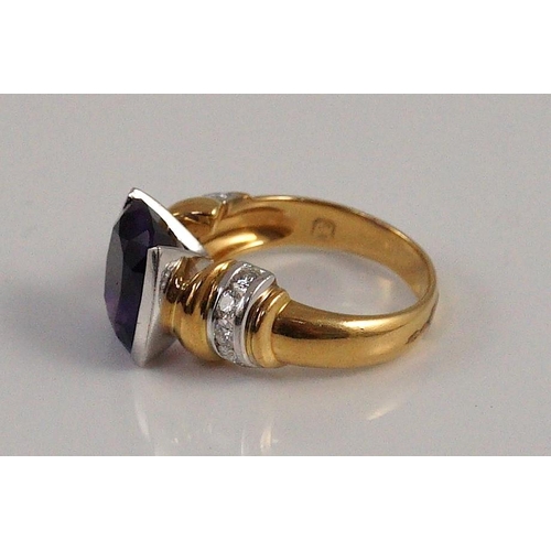 467 - A modern 18ct gold and single stone cushion cut amethyst set dress ring, with ten stone diamond set ... 