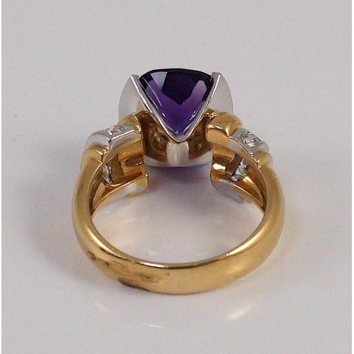 467 - A modern 18ct gold and single stone cushion cut amethyst set dress ring, with ten stone diamond set ... 