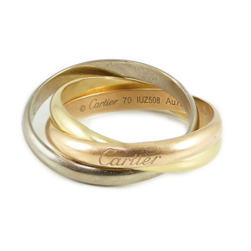 471 - A Cartier triple band three colour 750 yellow metal Trinity Classique Russian wedding ring, numb... 