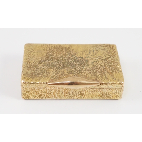 472 - A 1960's 9ct gold Cartier rectangular pill box, with samorodok decoration, signed Cartier, London an... 