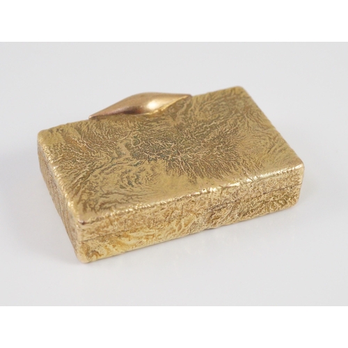 472 - A 1960's 9ct gold Cartier rectangular pill box, with samorodok decoration, signed Cartier, London an... 