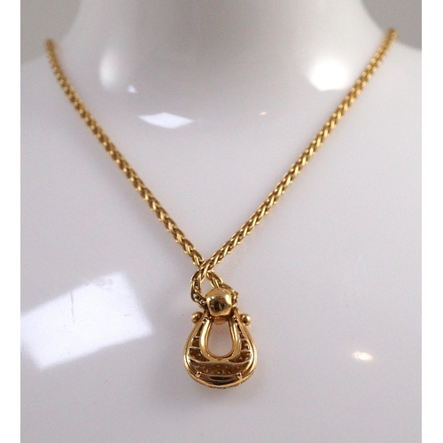 476 - A modern French 18ct gold and pave set diamond 'U' shaped pendant, on a French 18ct gold chain, pend... 