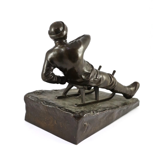 53 - A late 19th / early 20th century German bronze model of a tobogganist, on naturalistic base, inscrib... 