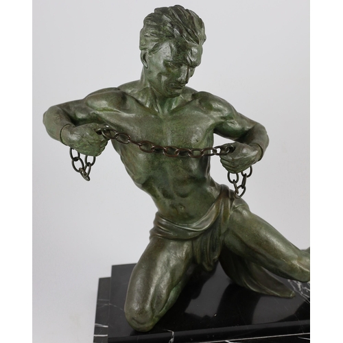 54 - Jean De Roncourt. A French Art Deco bronze 'Hercule brisant ses chaînes', on stepped marble plinth, ... 