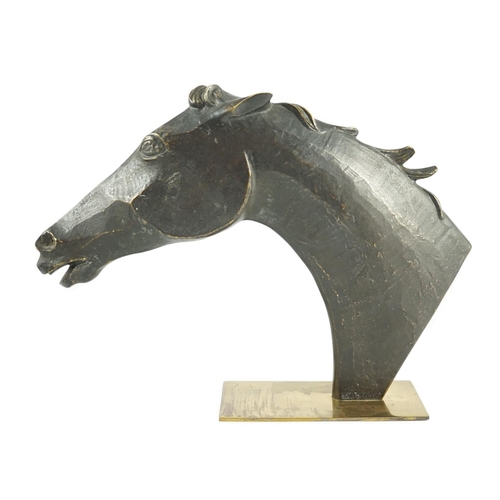 56 - A Hagenauer bronze relief of a horse's head, signed to the base, 23cm high 32cm long