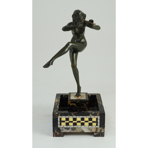 58 - Pierre Le Faguays (1892-1962). An Art Deco bronze figure of a female pan piper, standing holding one... 