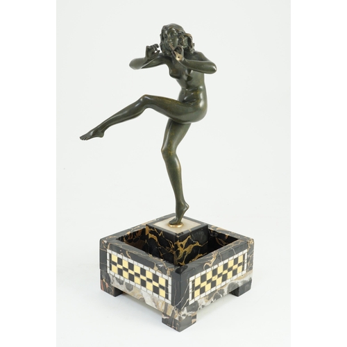 58 - Pierre Le Faguays (1892-1962). An Art Deco bronze figure of a female pan piper, standing holding one... 