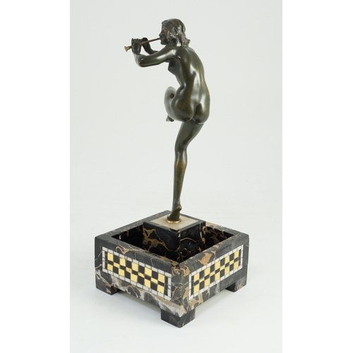 58 - Pierre Le Faguays (1892-1962). An Art Deco bronze figure of a female pan piper, standing holding one... 