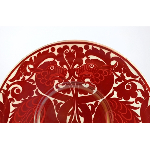 59 - A rare William de Morgan ruby lustre dish, c.1880, painted on a Staffordshire earthenware blank dish... 