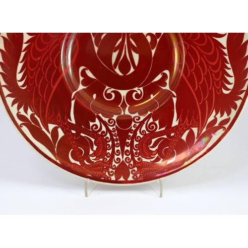 59 - A rare William de Morgan ruby lustre dish, c.1880, painted on a Staffordshire earthenware blank dish... 