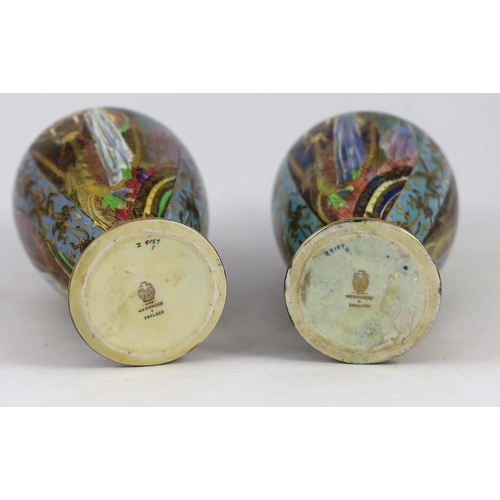 60 - N.B. RESTORATION TO ONE VASE. A pair of Wedgwood ’Candlemas’ Fairyland lustre vases, designed by Dai... 