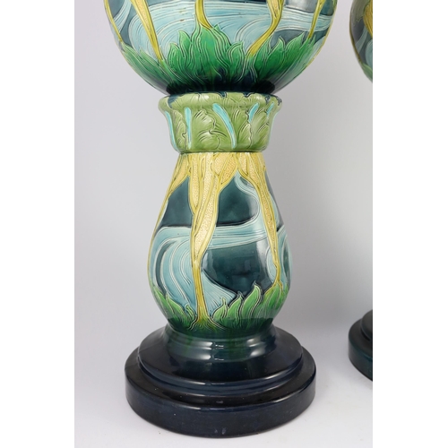 62 - A pair of Burmantofts Art Nouveau faience jardinieres on matching pedestals, c.1900, impressed marks... 