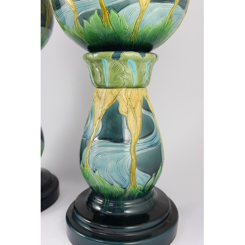 62 - A pair of Burmantofts Art Nouveau faience jardinieres on matching pedestals, c.1900, impressed marks... 