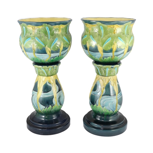 62 - A pair of Burmantofts Art Nouveau faience jardinieres on matching pedestals, c.1900, impressed marks... 