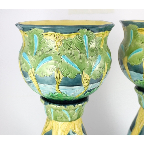 62 - A pair of Burmantofts Art Nouveau faience jardinieres on matching pedestals, c.1900, impressed marks... 