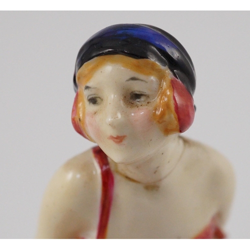 65 - A rare Royal Doulton figure, 'Negligee' HN1272, 12cm high, head broken and restuck