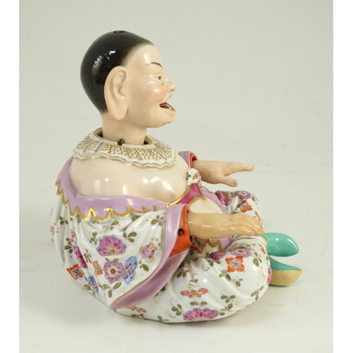 75 - A Meissen figure of a nodding chinaman, 19th century, with weighted nodding head, moving tongue and ... 