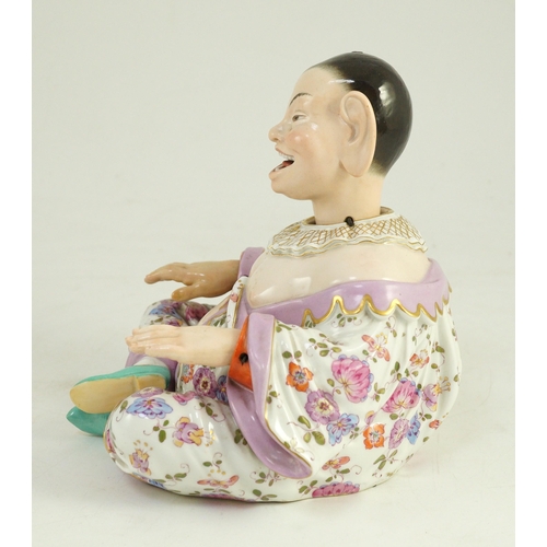 75 - A Meissen figure of a nodding chinaman, 19th century, with weighted nodding head, moving tongue and ... 