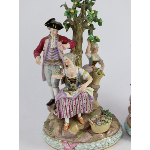 76 - A pair of Meissen groups of apple pickers and flower gatherers, 19th century, blue crossed swords ma... 