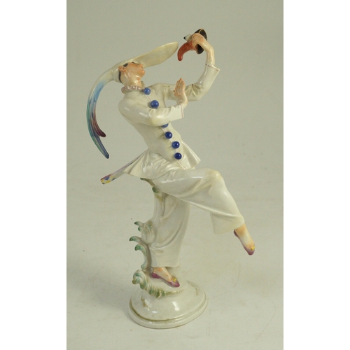 78 - A Meissen figure of masked dancer from the Tales of Hoffmann, modelled by Scheurich, blue crosse... 