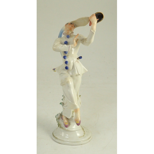 78 - A Meissen figure of masked dancer from the Tales of Hoffmann, modelled by Scheurich, blue crosse... 