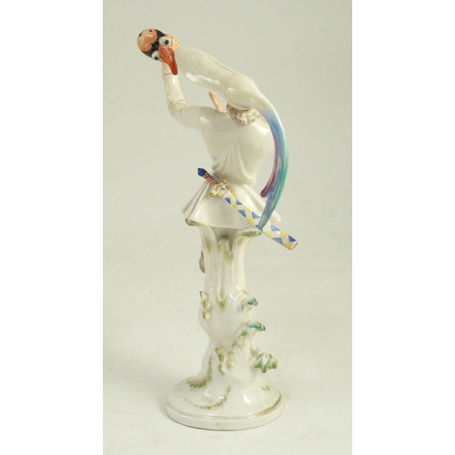 78 - A Meissen figure of masked dancer from the Tales of Hoffmann, modelled by Scheurich, blue crosse... 