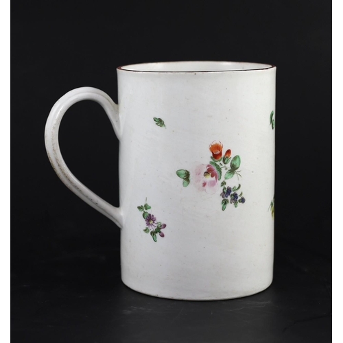 86 - A large Bristol porcelain mug, c.1770-5, painted with floral sprays, blue mark X 6., 14cm high... 