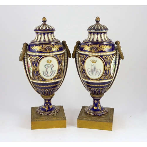 88 - A pair of English porcelain Sevres style ormolu mounted vases and covers, mid 19th century, each fin... 