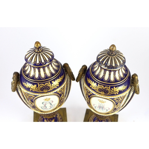 88 - A pair of English porcelain Sevres style ormolu mounted vases and covers, mid 19th century, each fin... 