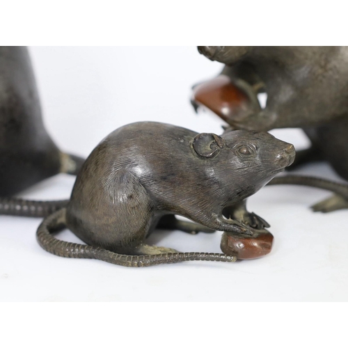 94 - An assembled group of five Japanese bronze and mixed metal models of rats, Meiji period, each rat ho... 