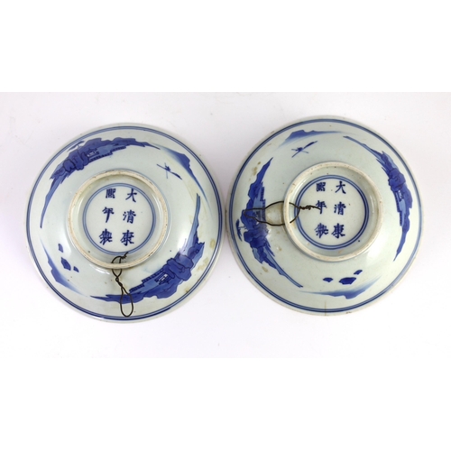 99 - A pair of Chinese blue and white small dishes, Kangxi six character marks and of the period (1662-17... 