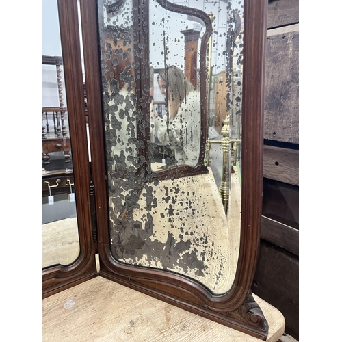 2014 - An early 20th century French carved walnut folding triple dressing table mirror, height 106cm