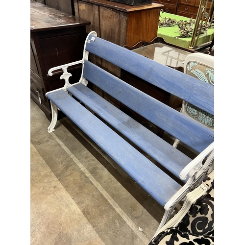 2020 - A Victorian style painted cast iron and wooden slatted garden bench, length 131cm, depth 54cm, heigh... 