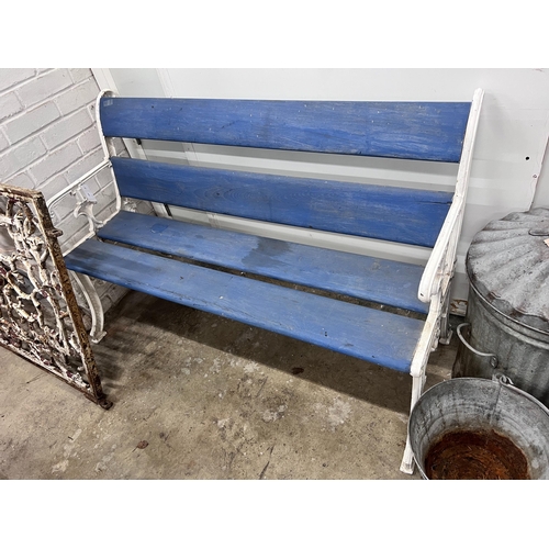 2020 - A Victorian style painted cast iron and wooden slatted garden bench, length 131cm, depth 54cm, heigh... 