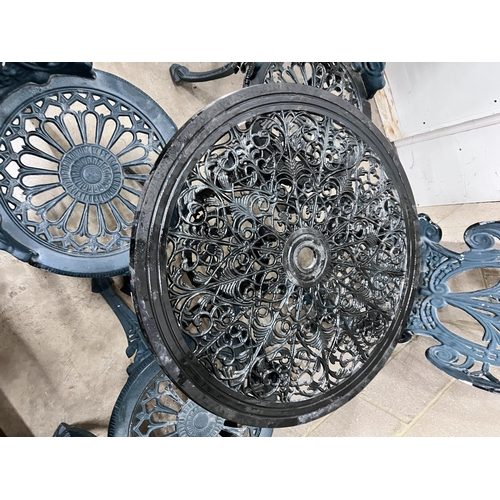 2024 - A Victorian style aluminium circular garden table, diameter 60cm, height 62cm and four chairs