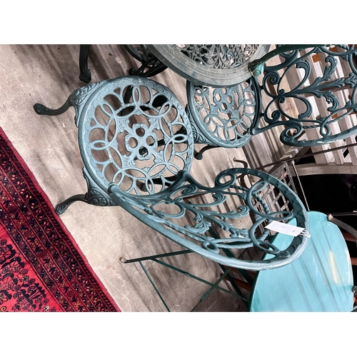 2031 - A Victorian style painted aluminium circular garden table, four chairs and a low garden table, large... 