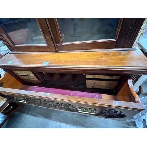 2043 - A late Victorian carved walnut secretaire bookcase, width 123cm, depth 48cm, height 234cm