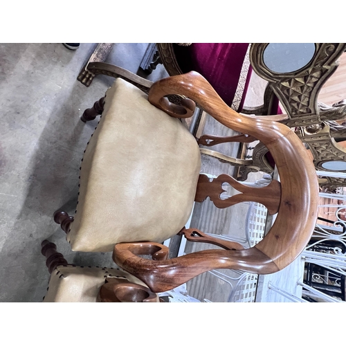 2049 - A pair of Victorian walnut elbow chairs with light brown leather seats, width 59cm, depth 51cm, heig... 