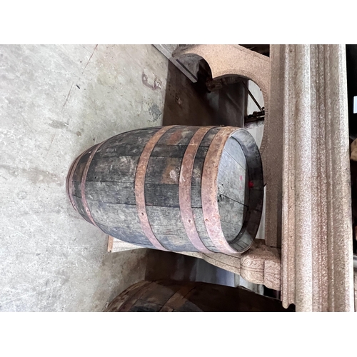 2087 - Three iron bound staved wood barrels, largest height 98cm